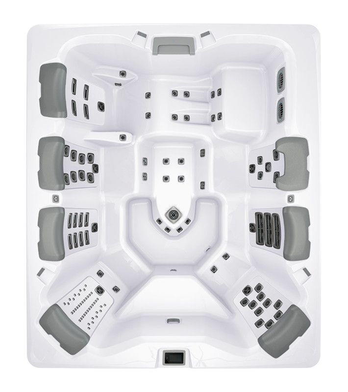 Top-down view of a white hot tub with gray headrests and jets.