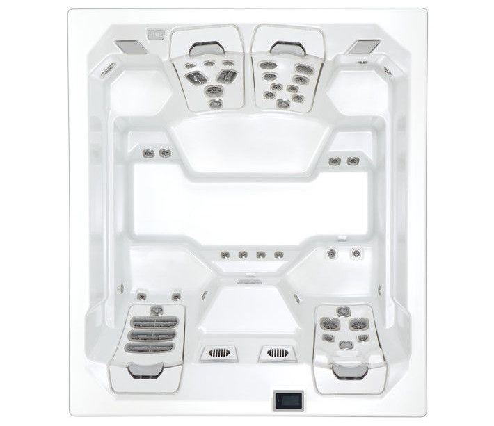 Top-down view of a white rectangular hot tub with multiple seating areas and jet controls.