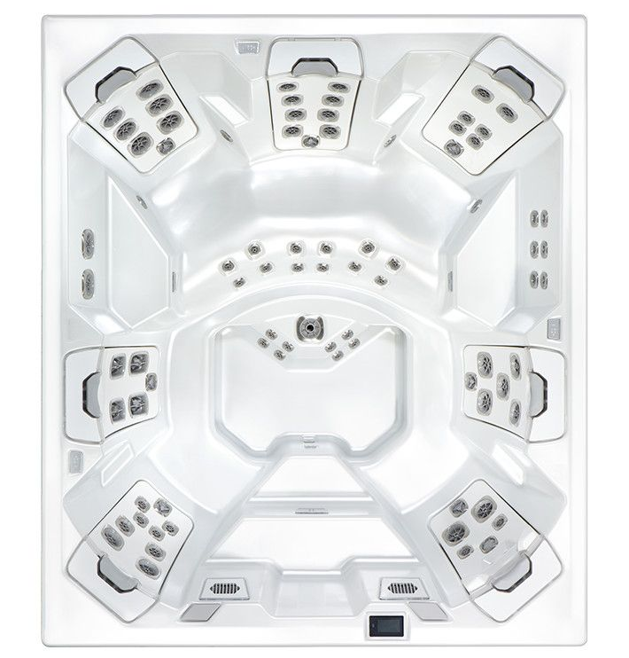 Top-down view of a white hot tub with various seating areas and multiple jets.