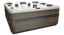 A square hot tub with a gray wooden exterior and a white interior.