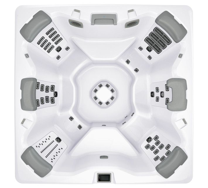 Overhead view of a white hot tub with gray seating and many jets.