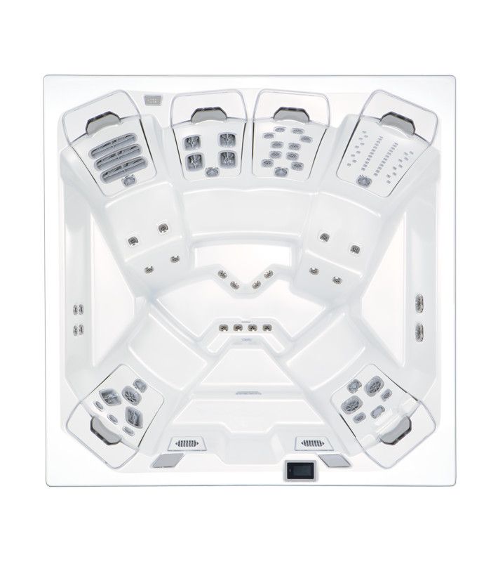 Overhead view of a white, multi-seat hot tub with built-in jets and control panels.