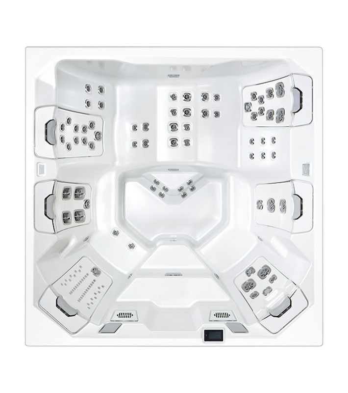 Top-down view of a large, white hot tub with various seating areas and numerous water jets.