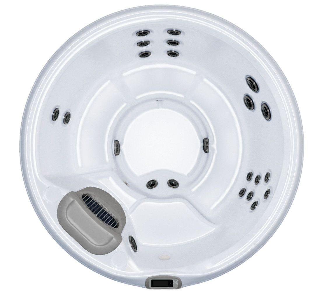 Overhead view of a white, round hot tub with multiple jet nozzles.