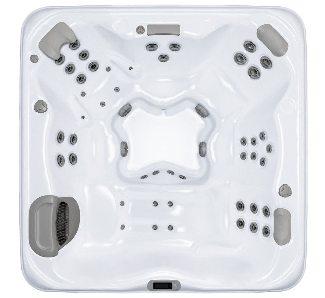 Overhead view of a white square hot tub with multiple jets, seats, and gray headrests.