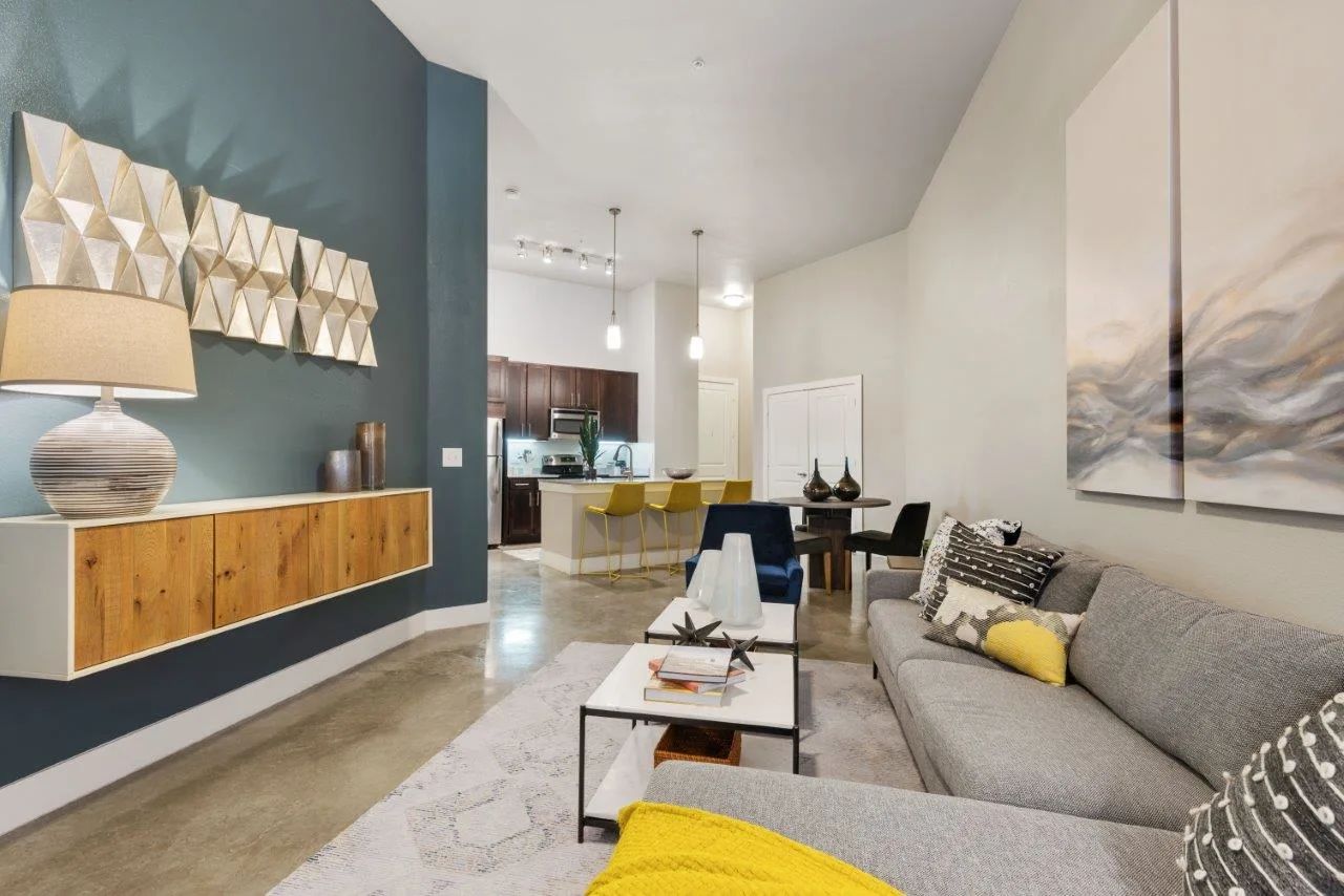 A living room with a couch and a coffee table.