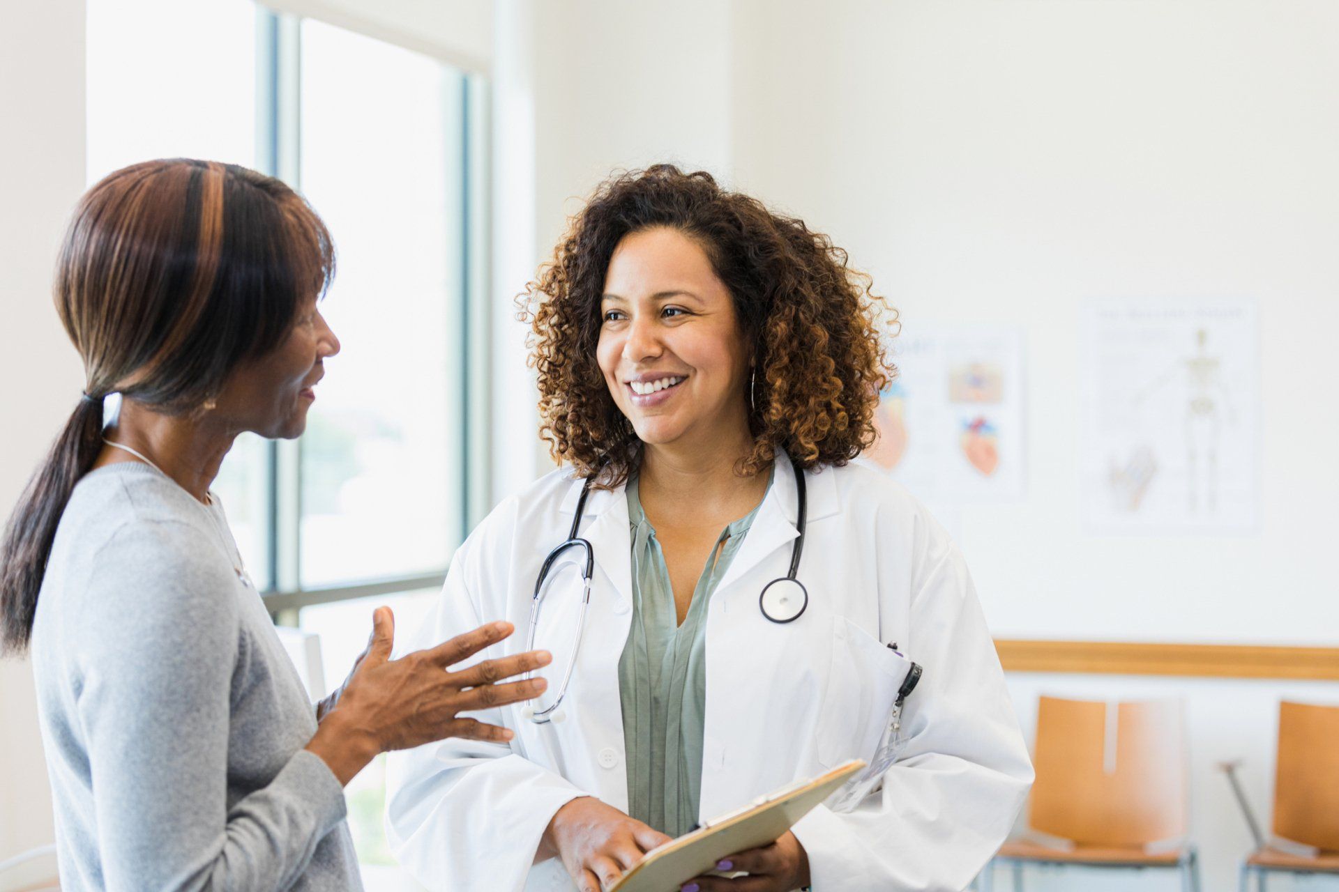 Beautiful blond girl is consulting a doctor