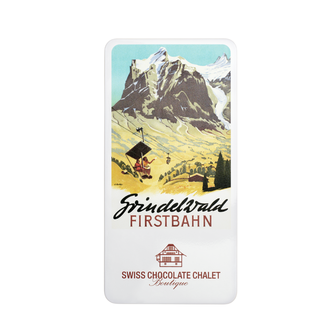 Schweizer Schokoladenverpackung mit Alpenpanorama und dem Schriftzug „Fridbqnd Firstbahn“