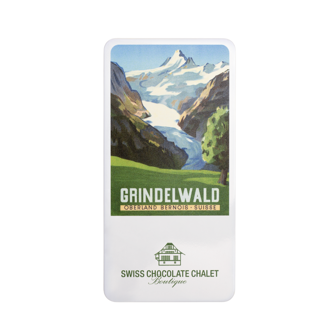 Schweizer Schokoladenverpackung mit Bergkulisse, beschriftet mit „Grindelwald“ und „Swiss Chocolate Chalet“