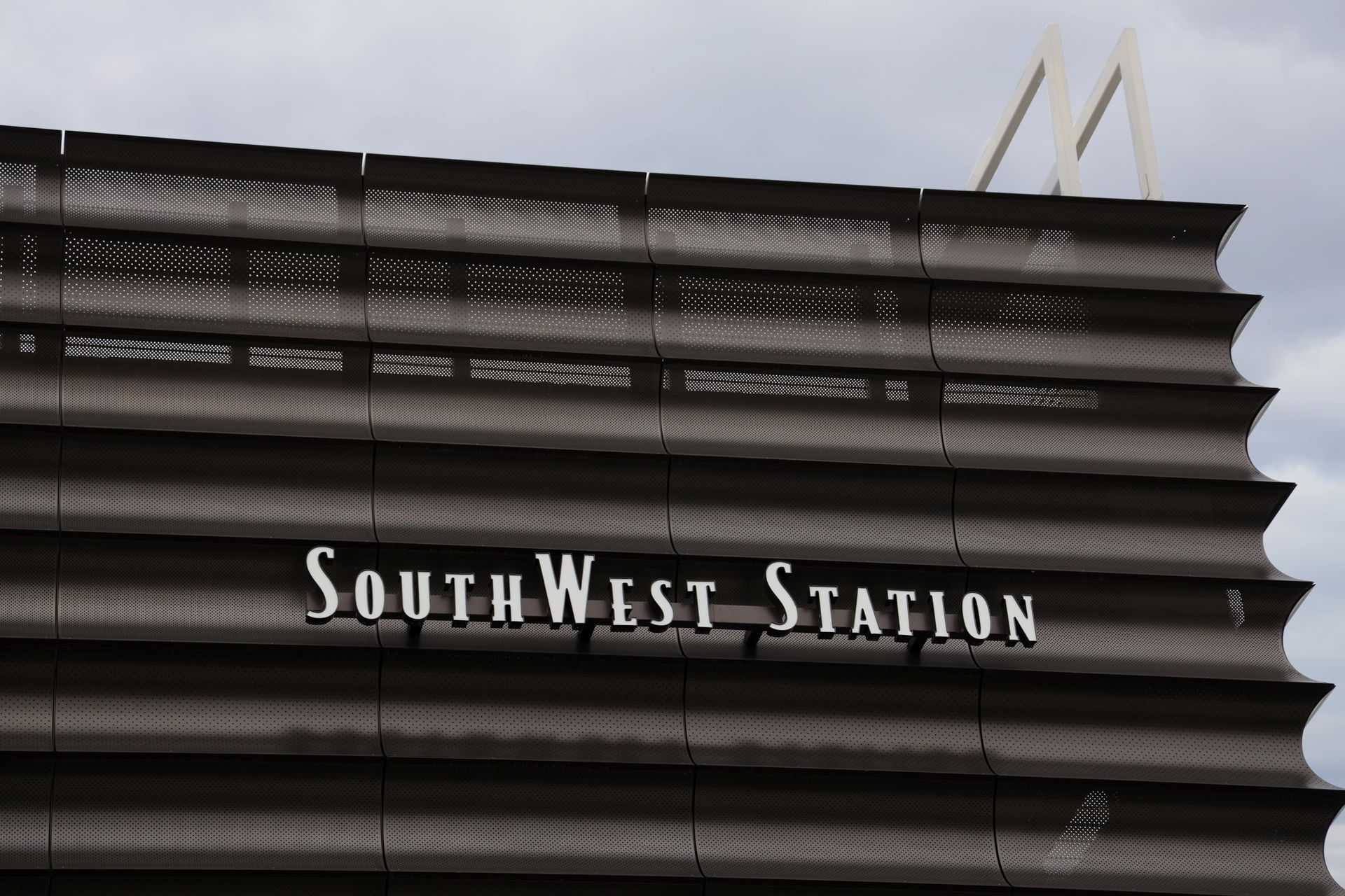 A building with the words southwest station on it
