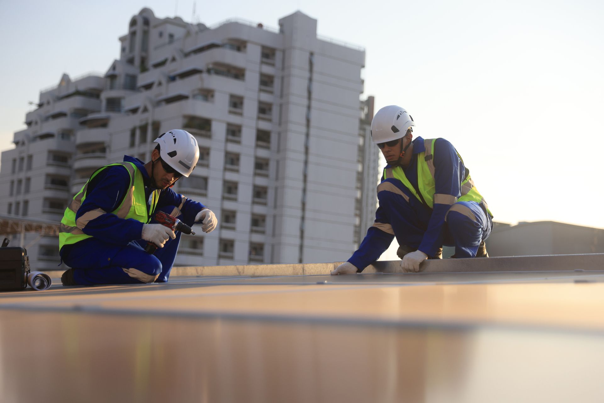 Roofing contractors from Berwald Roofing Inc. performing flat roof repair in Minneapolis, MN, ensuring durability and safety.