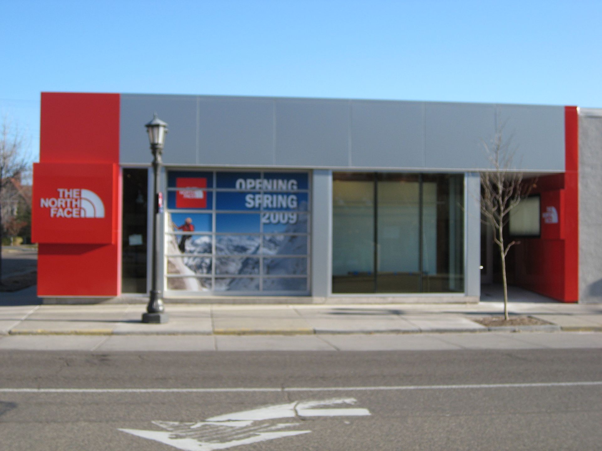 The North Face store exterior with red and gray facade; 