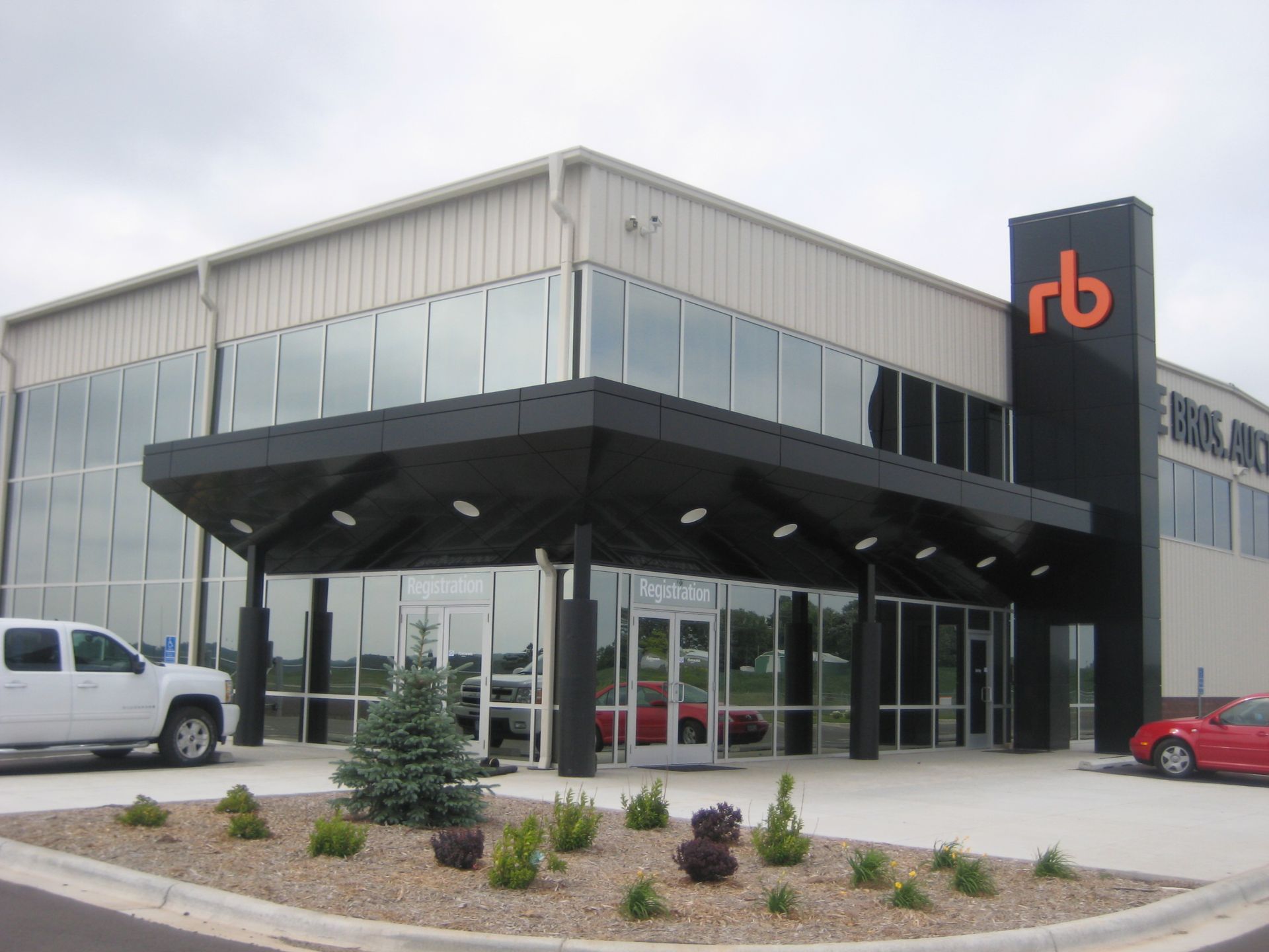 Modern building with large windows and black accents, 