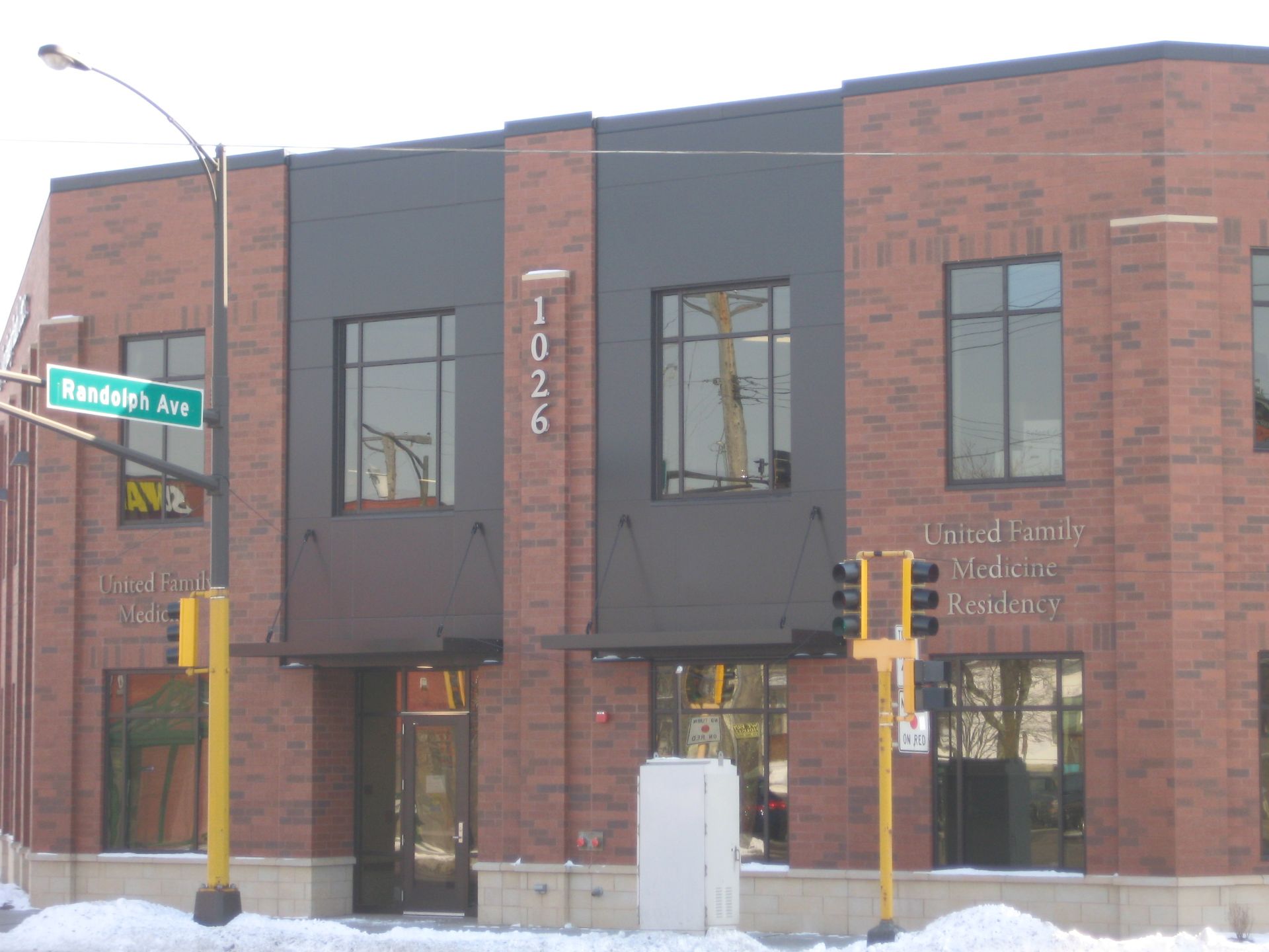 Red brick building with black accents, 