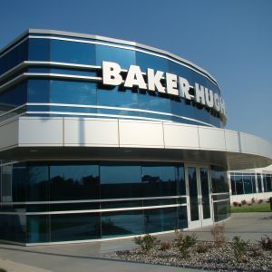 Baker Hughes building with reflective blue windows and sign.
