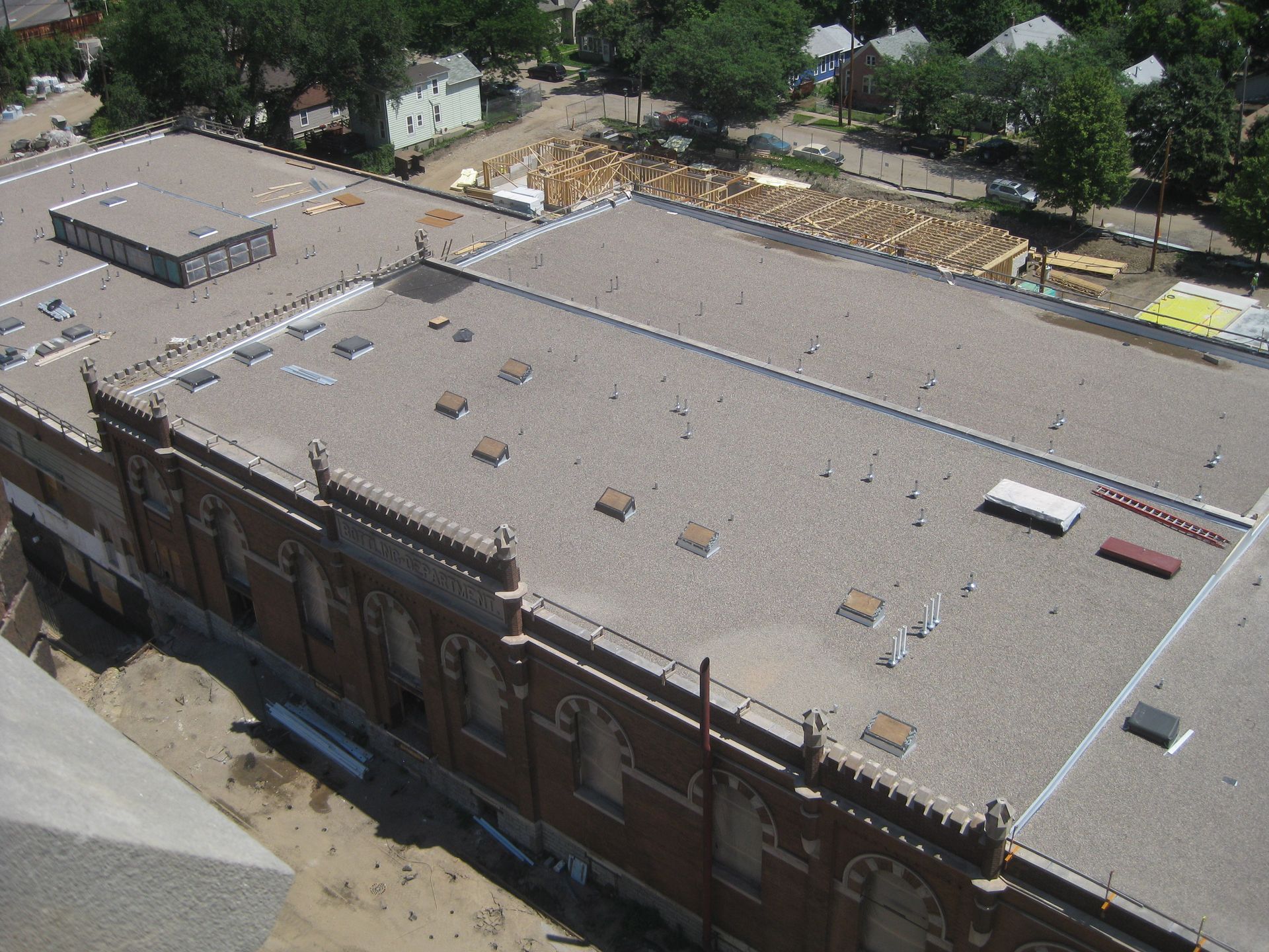 An aerial view of the roof of a building under construction