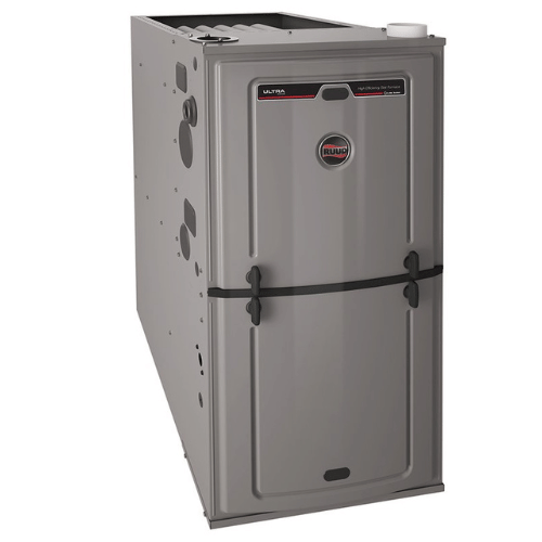 A gray Rheem gas furnace standing upright, featuring a front access panel with black handles and a logo.