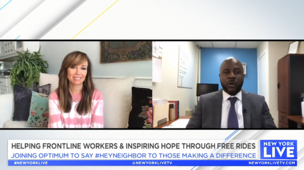 Two people in a TV news split-screen with a banner about frontline workers and free rides