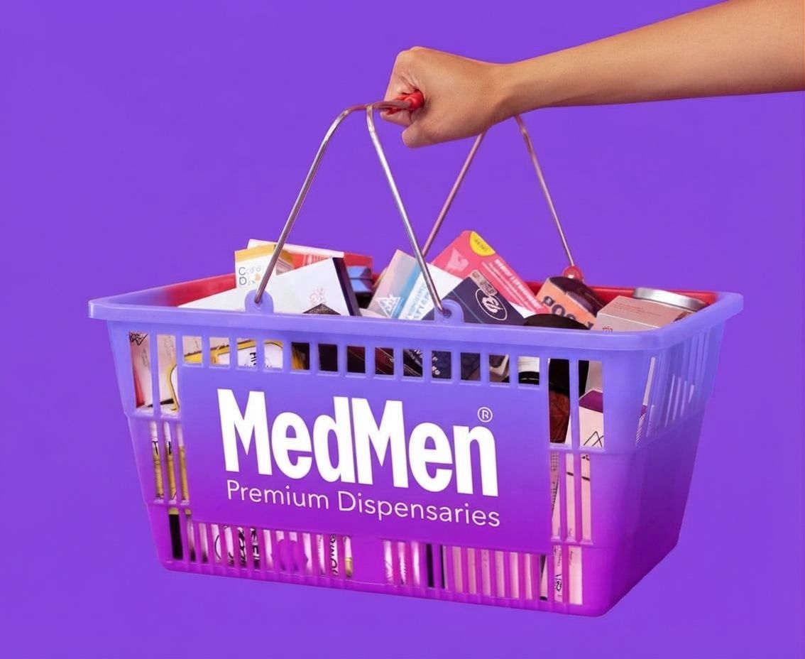 Purple MedMen shopping basket with assorted products and a hand holding the handle