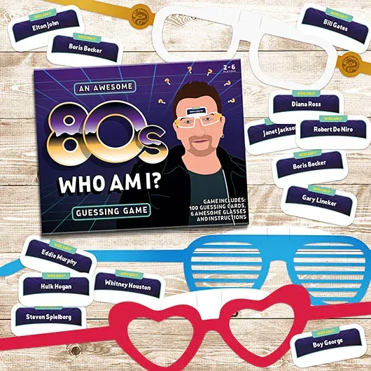 The 80s who am i guessing game is sitting on a wooden table.
