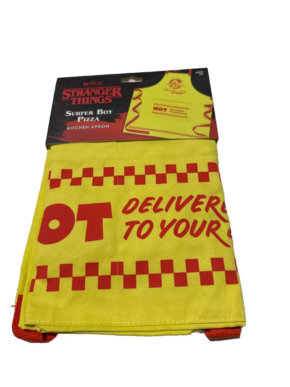 A yellow towel that says stranger things deliver to your