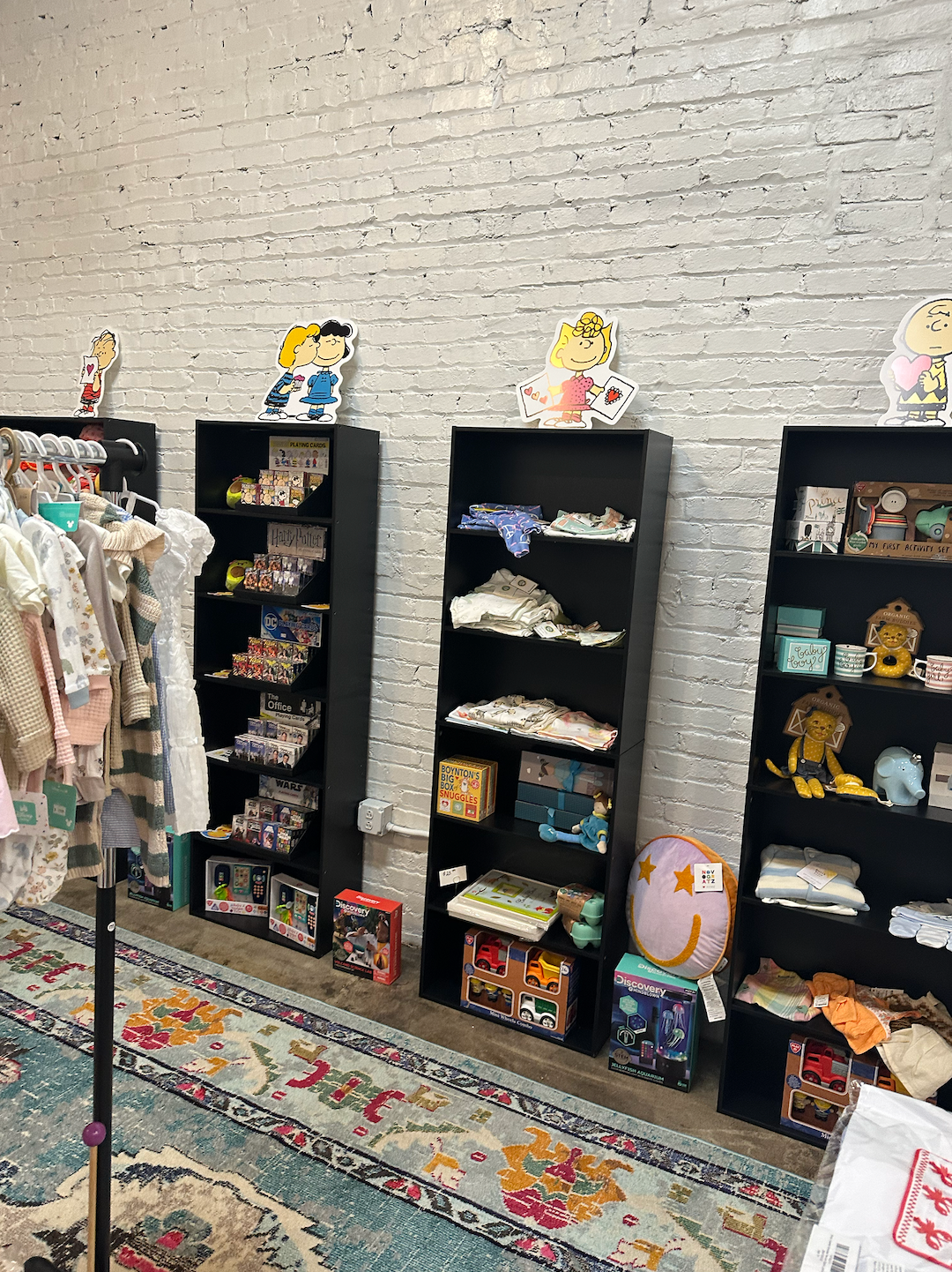 A room filled with lots of shelves and toys.
