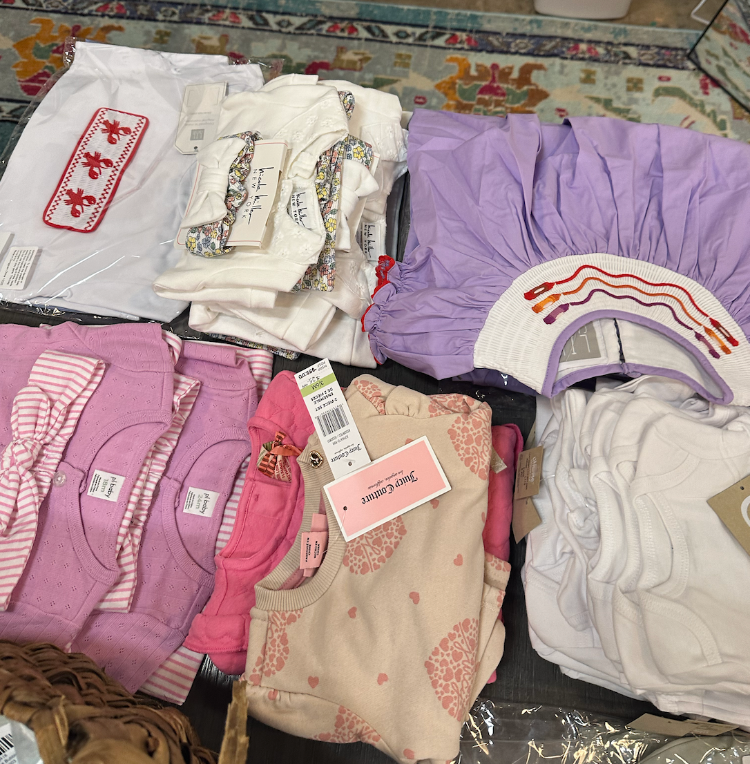 A bunch of clothes are stacked on top of each other