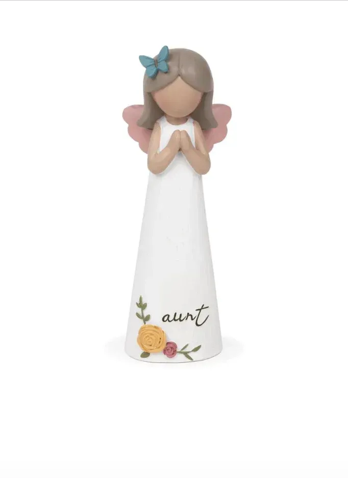 A figurine of an angel with the word aunt on it