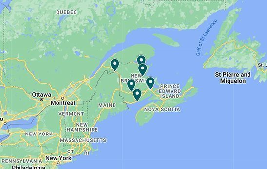 A map of New Brunswick, Canada with a bunch of pins on it.