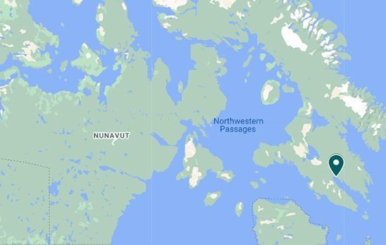 A map showing the location of a small island in the middle of the ocean.