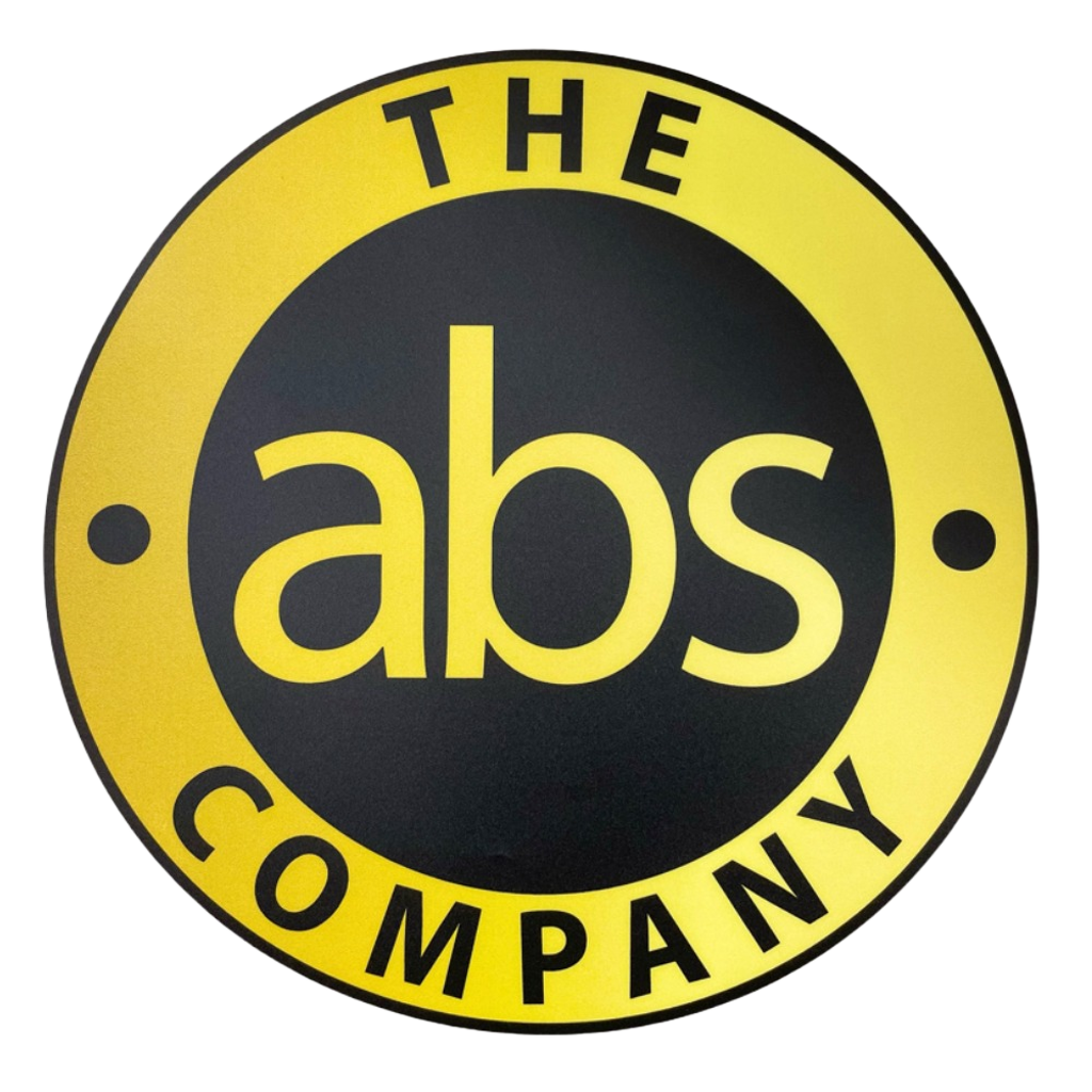 Logo for The Abs Company, featuring yellow text inside a black circle surrounded by a yellow ring.