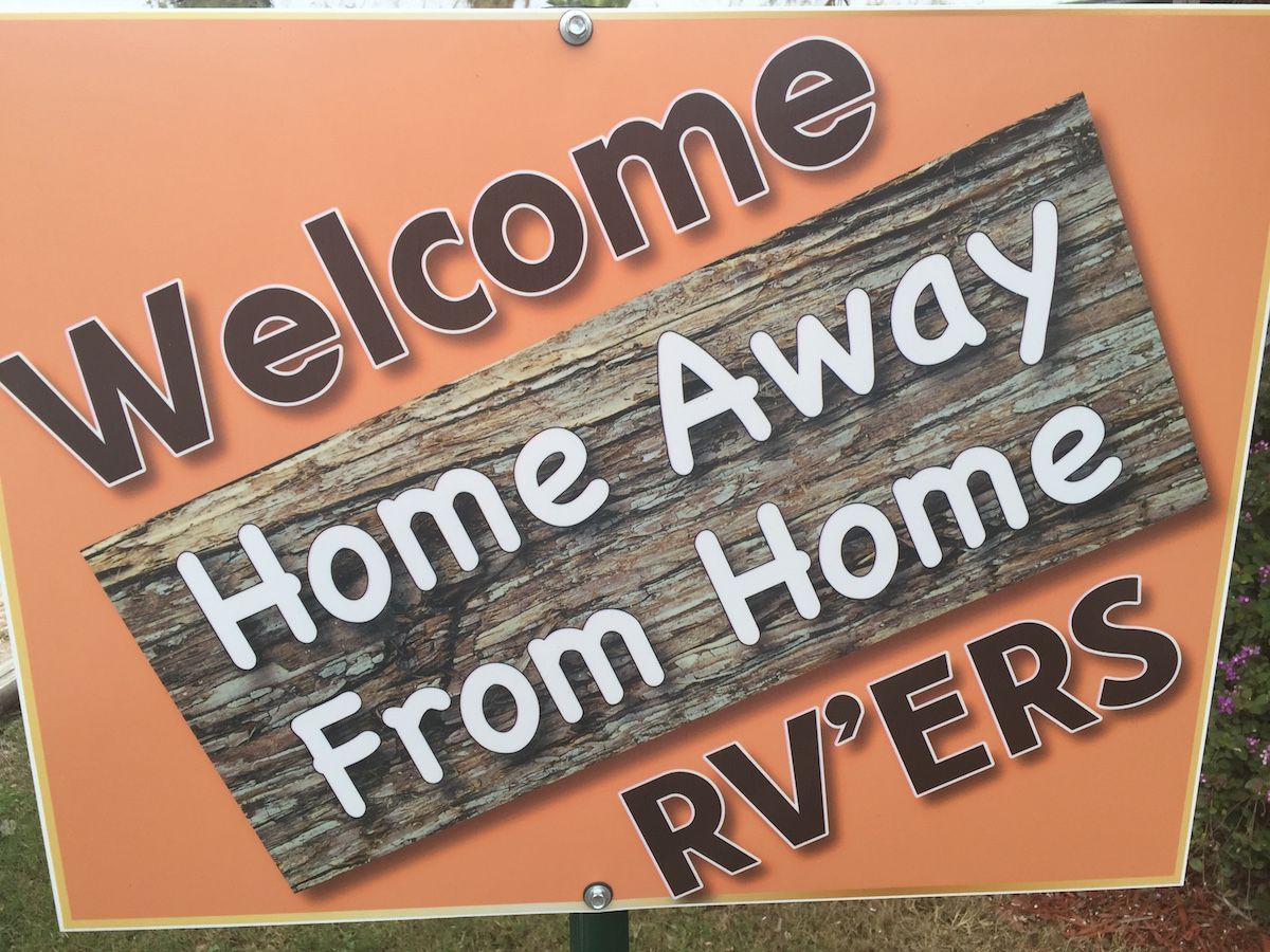 A sign that says welcome home away from home rvers