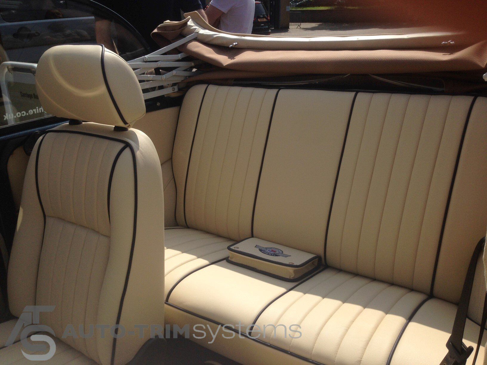 Morris Minor cabriolet interior with custom cream leather and blue piping