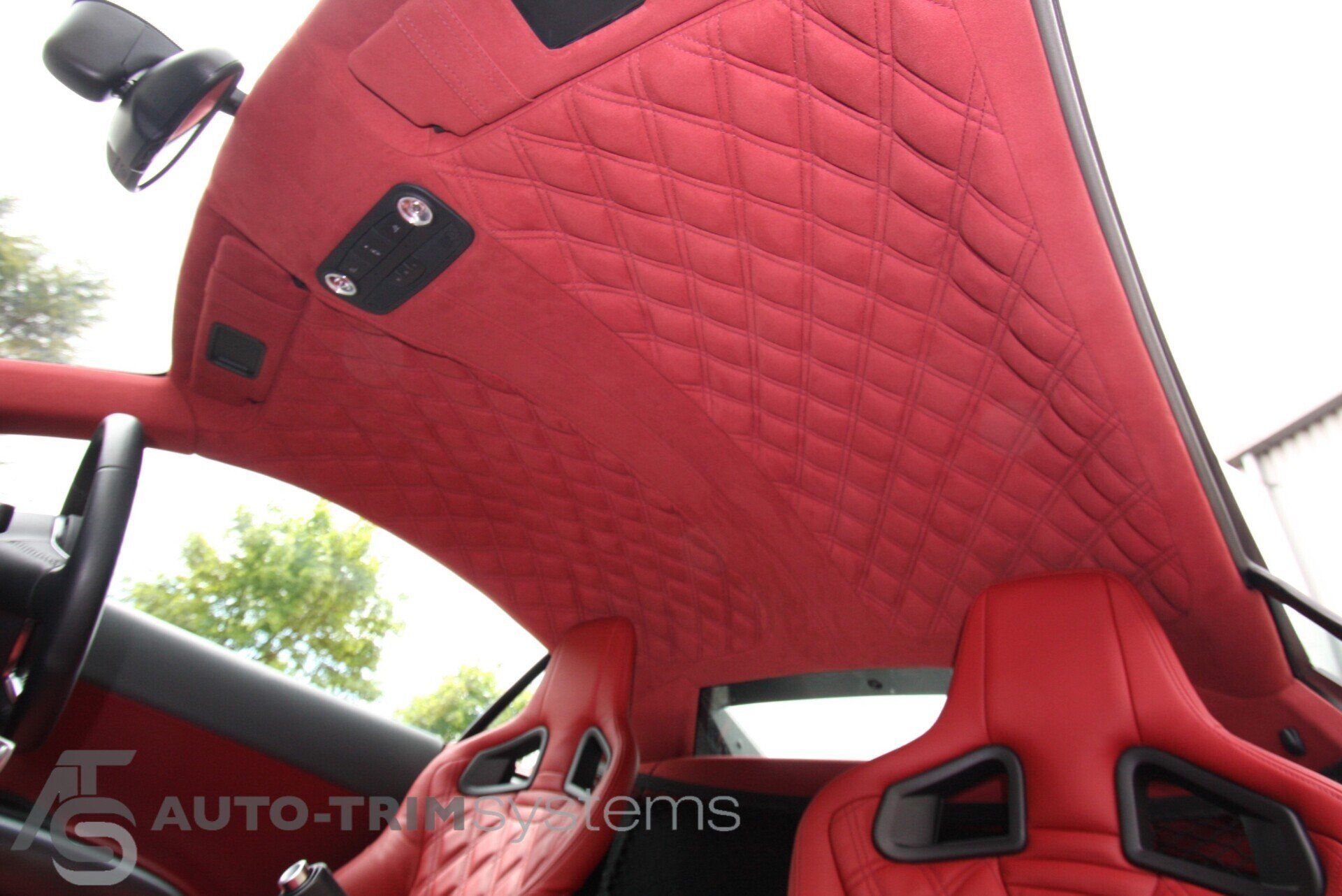 Audi R8 with diamond-stitch red leather headlining