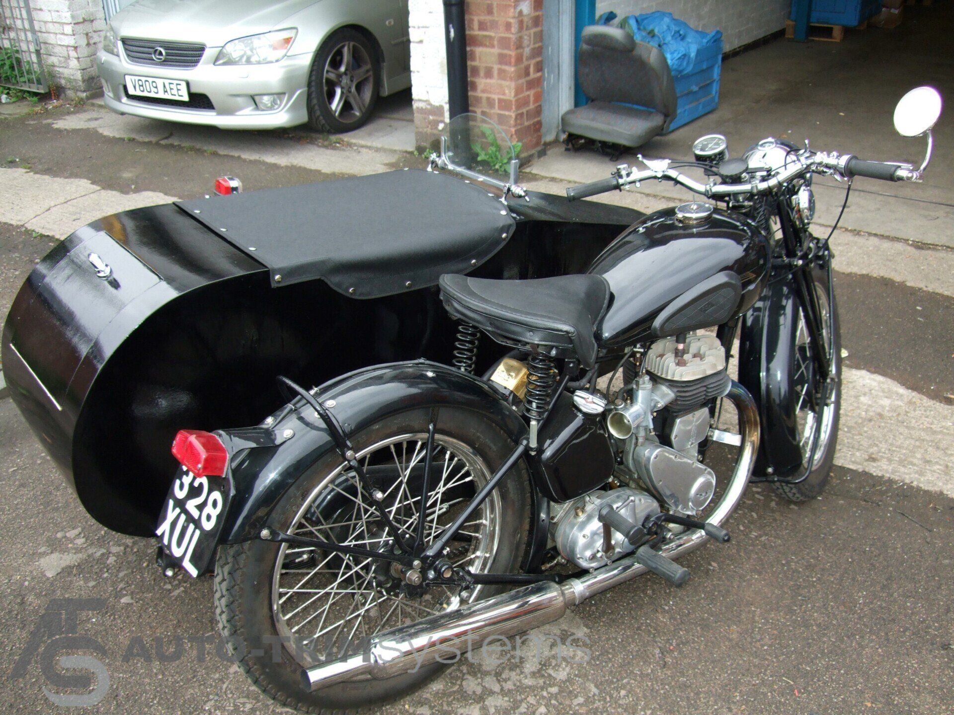 Norton motorbike with side car and tailored tonneau cover
