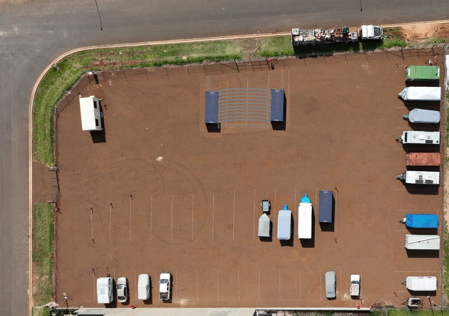 Four Large Gray Industrial Garage Doors  — Tableland Self Storage In Costa Street, QLD