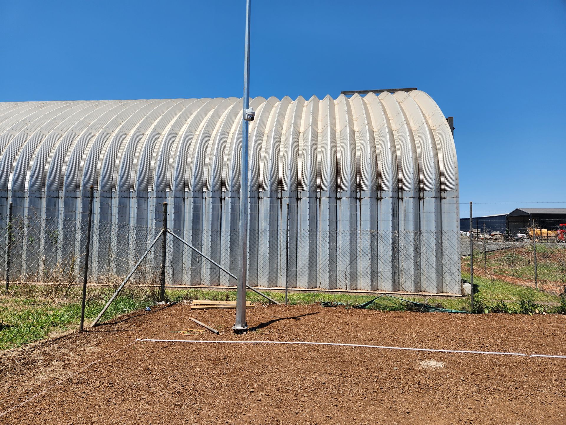 Two Tan Corrugated Roll-up Doors — Tableland Self Storage In Costa Street, QLD