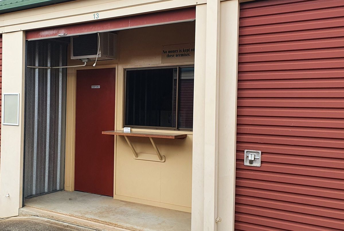 Red and Tan Booth With Window — Tableland Self Storage In Atherton, QLD