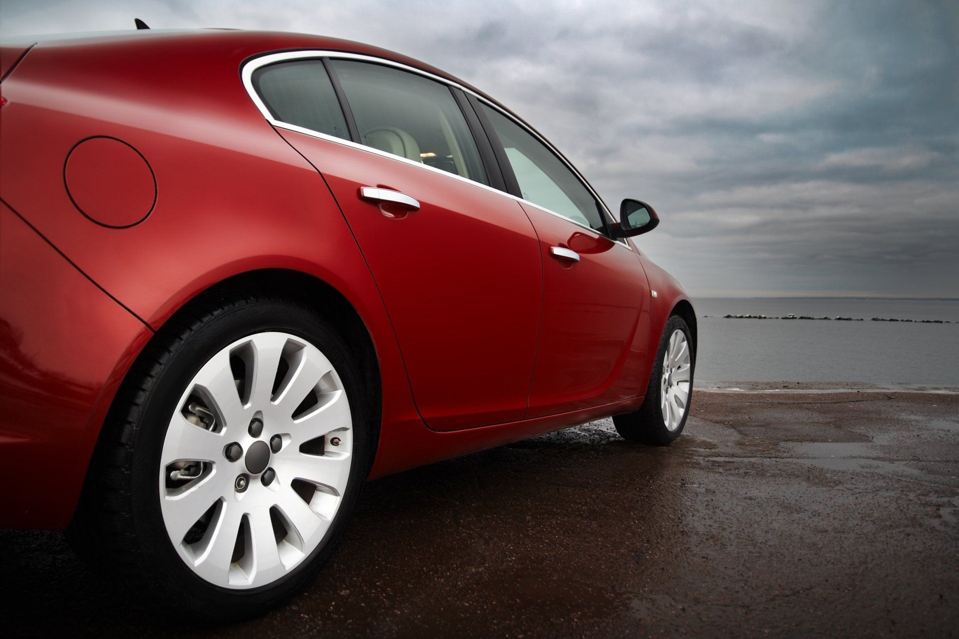 Red car — Milan, IL — Paintless Dent Removal