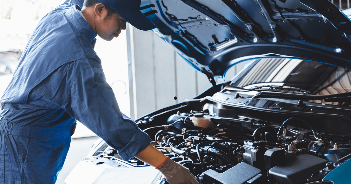 an auto mechanic doing a repair