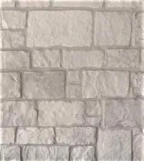 Gray stone brick wall with uneven rectangular blocks and mortar lines