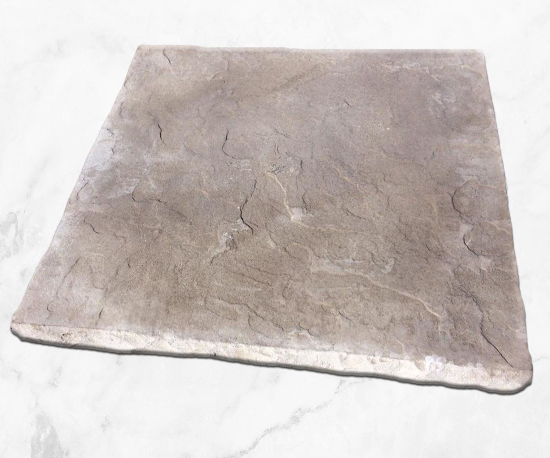 Square gray stone slab with a rough, cracked surface on a white background