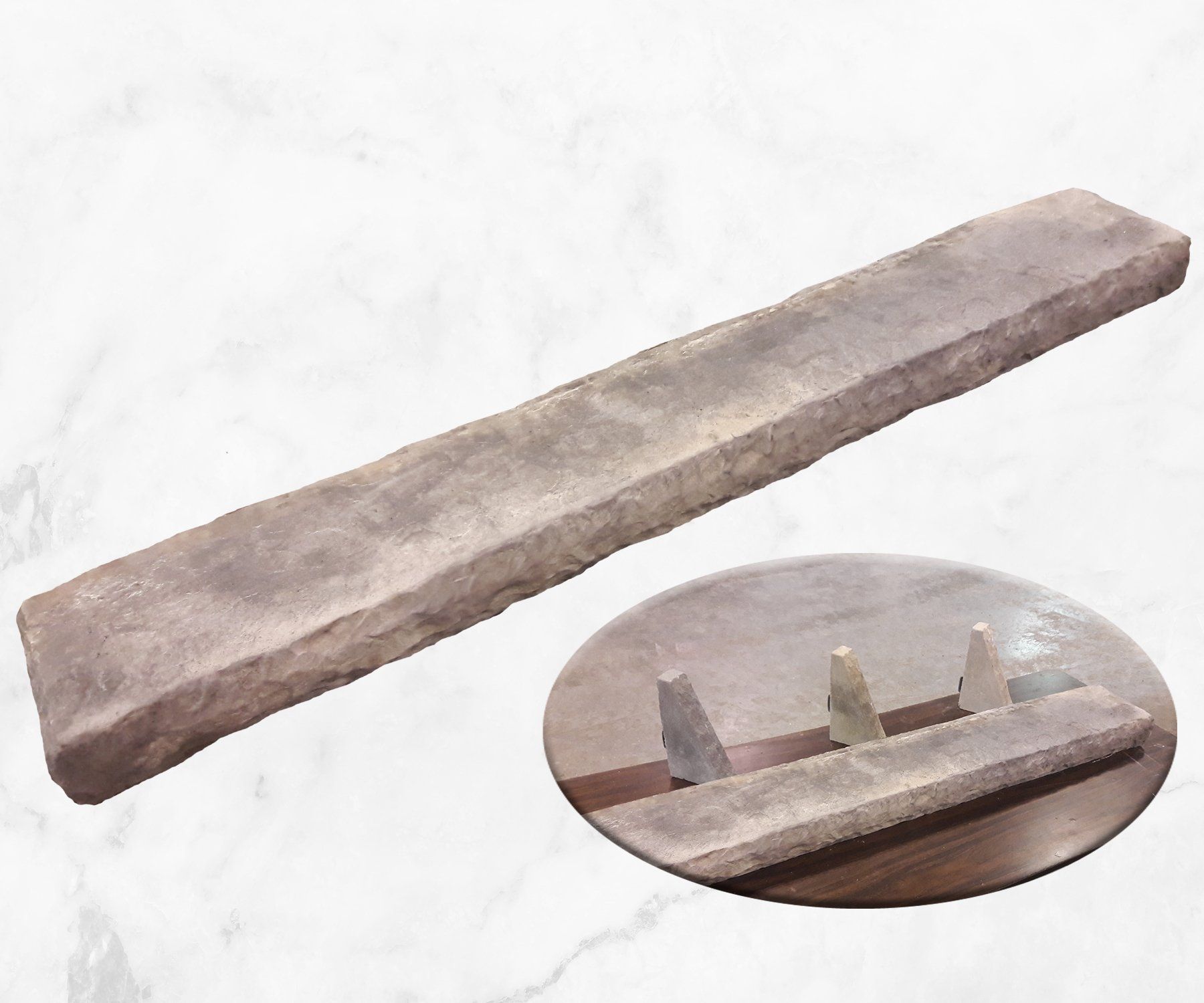 Long gray stone beam with a close-up inset showing its carved underside and pegs