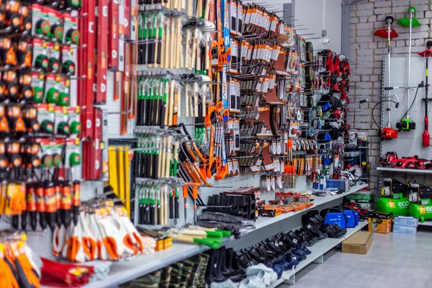 Hardware store display of tools and equipment on shelves. Hardware store display of tools and equipment on shelves.