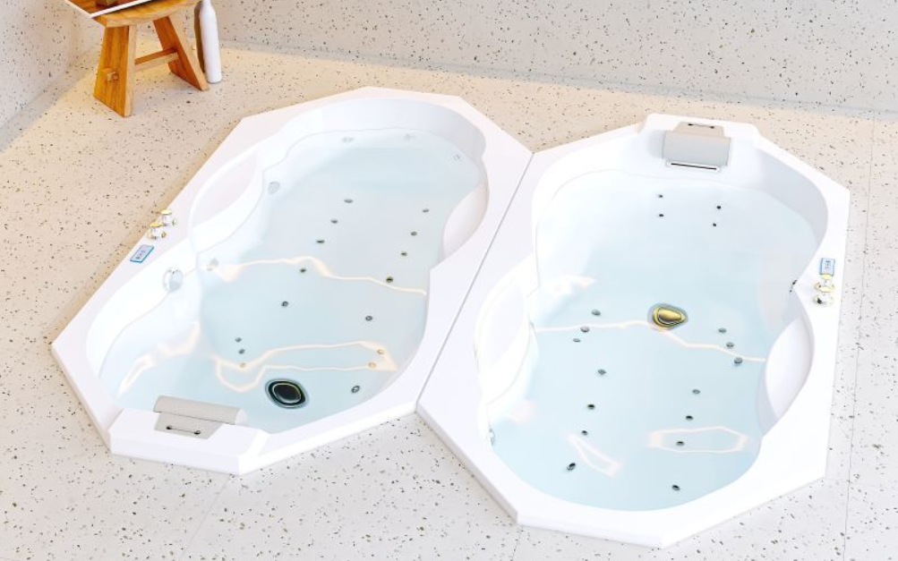 Baignoire Balnéo ergonomique à encastrer en angle avec un profil anatomique et des accoudoirs. Dimension 170X85