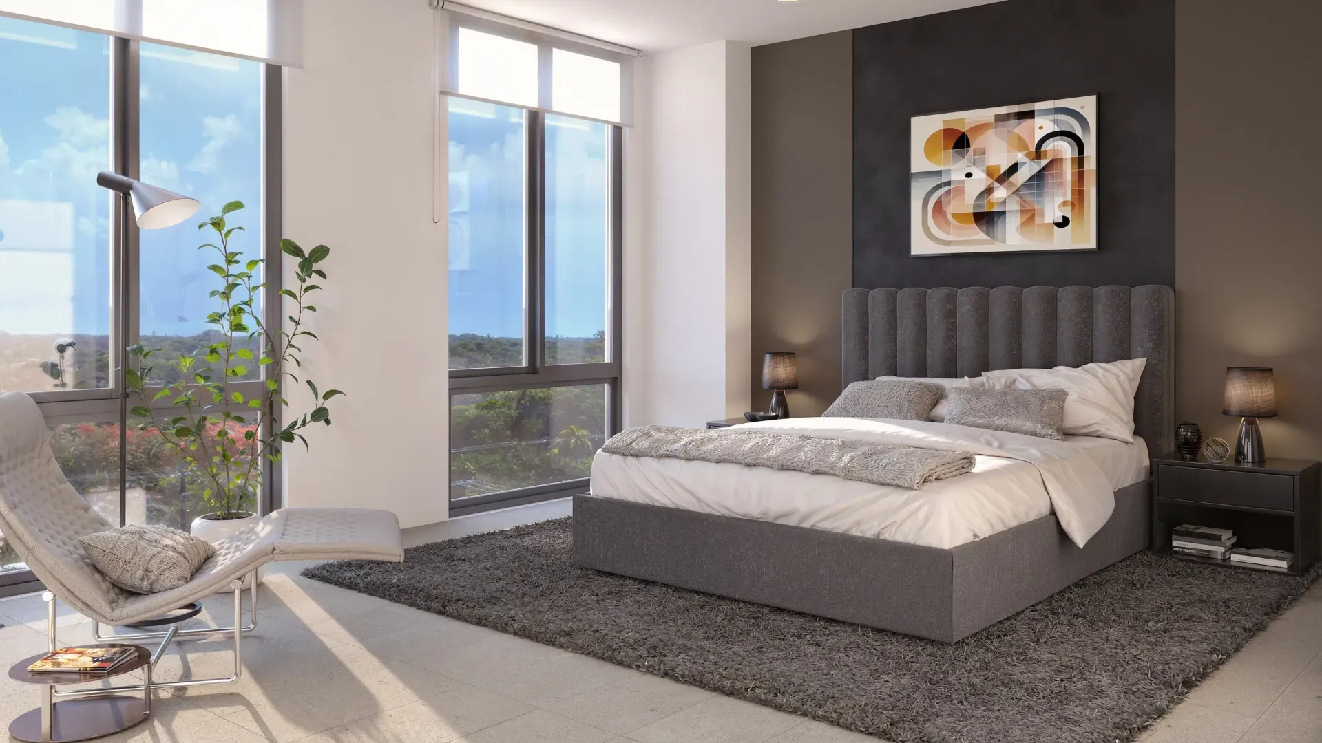 Modern bedroom with a large bed, gray rug, floor-to-ceiling windows, and a lounge chair by the bright city view.