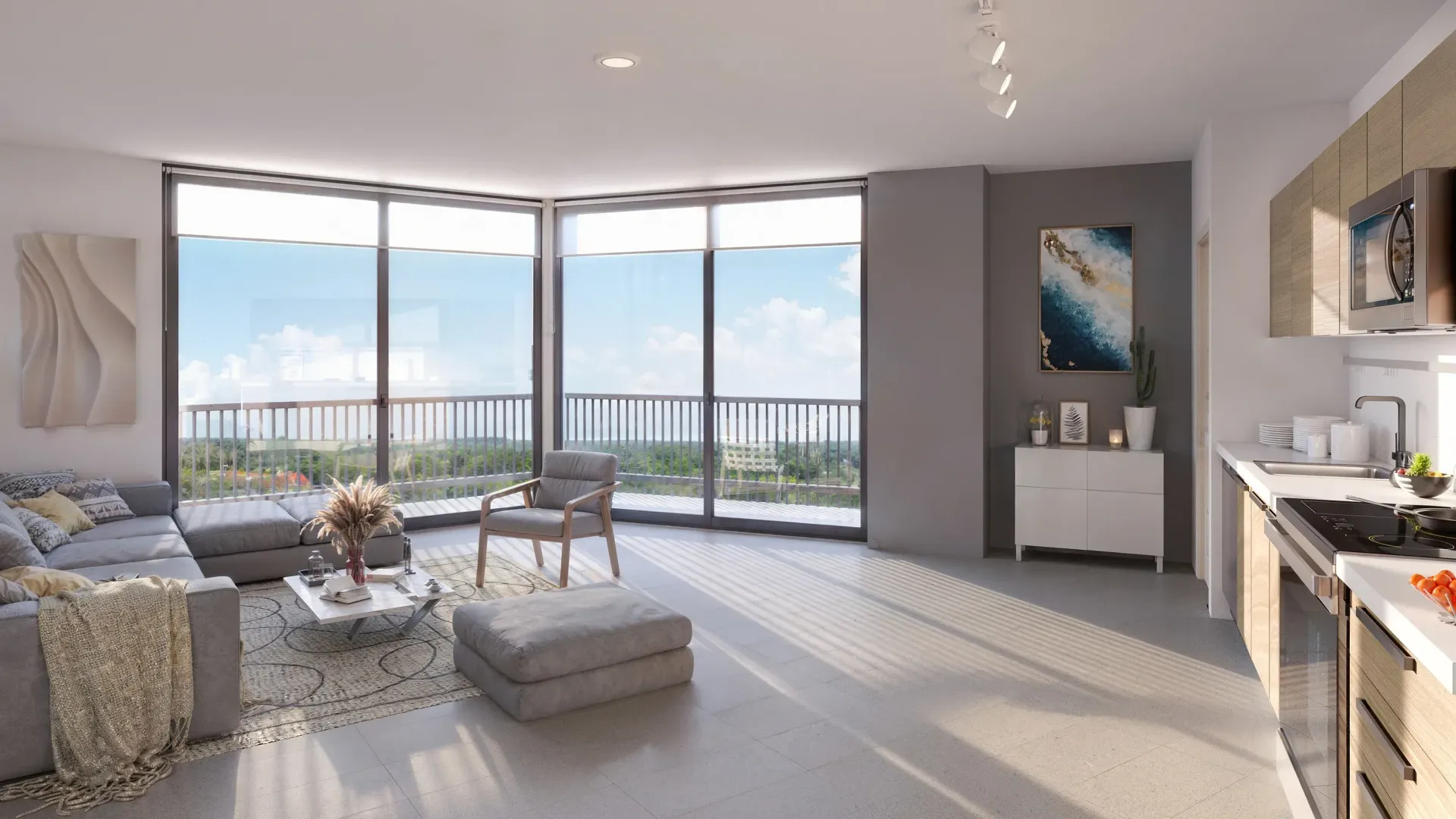 Bright modern living room with floor-to-ceiling windows, ocean view, and light gray furnishings