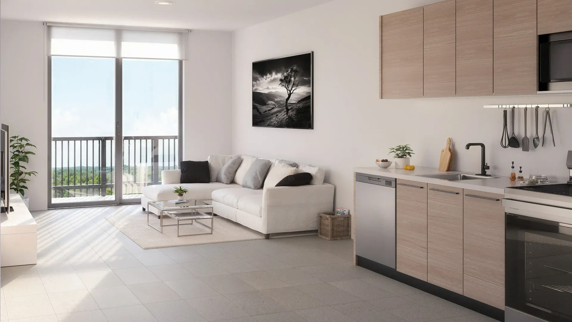 Bright modern living room with white sofa, coffee table, balcony doors, and kitchen area