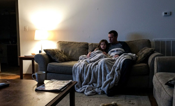 Happy family enjoying perfect indoor heating and cooling comfort in their Spokane home.