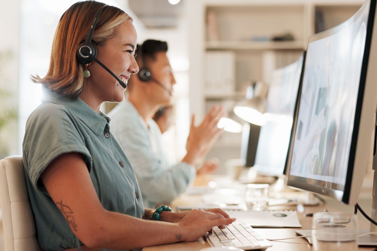 Quality Payroll & Benefits' dedicated support team assisting clients with timekeeping and payroll questions